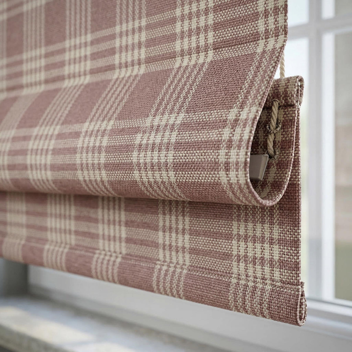 Mauve Roman shade with cream windowpane checks.